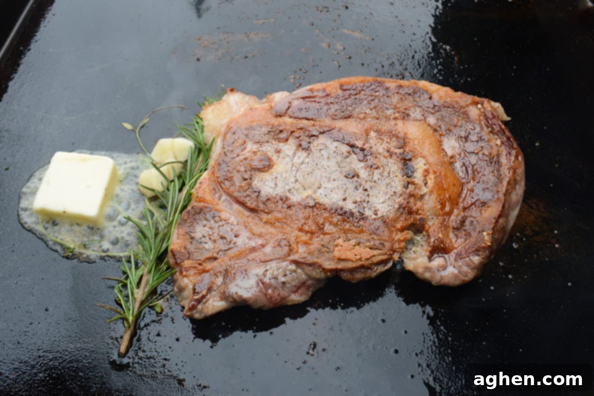 Mastering Steak on the Blackstone Griddle 7 ribeye steak with butter and aromatics
