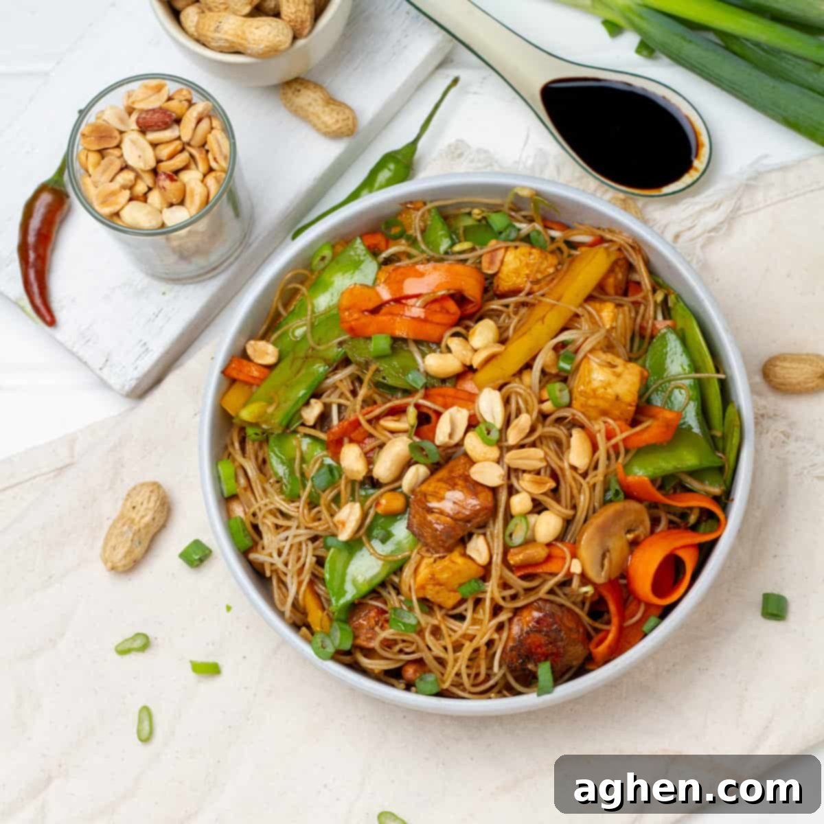 Dangerously Delicious Weight Watchers Thai Noodles 2 Thai Noodles served on table, garnished with peanuts and fresh herbs