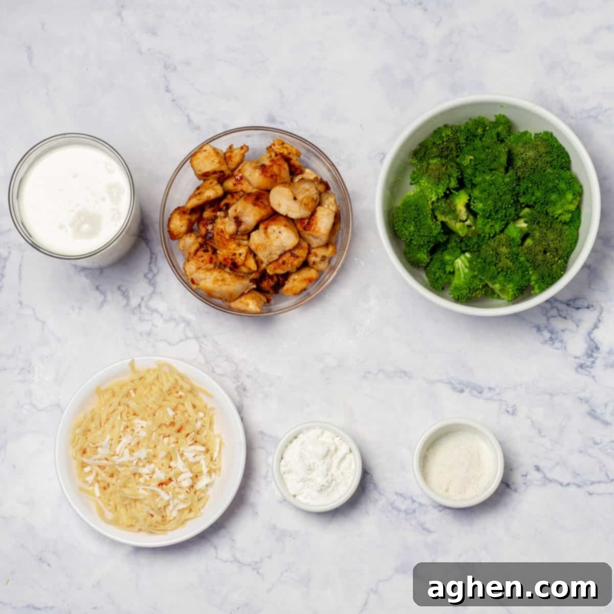 Skinny Chicken Divan Perfection 3 A bowl of cornstarch, shredded mozzarella and milk, ingredients for Chicken Divan sauce.