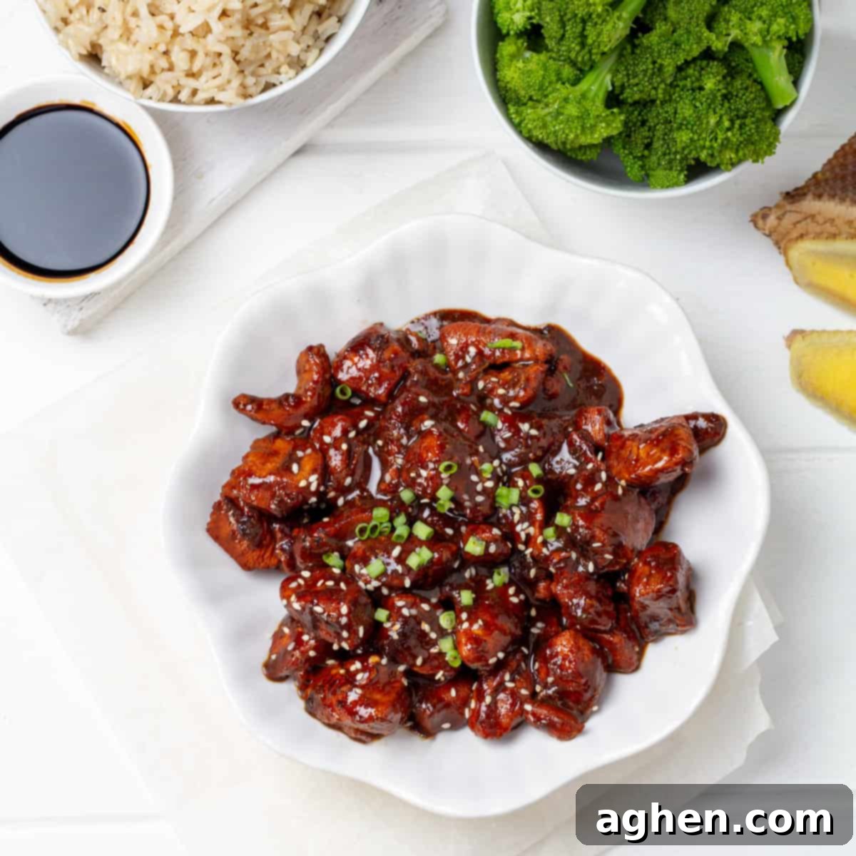 Weight Watchers' Beloved Chicken Teriyaki 2 Chicken Teriyaki served with rice and broccoli, garnished with sesame seeds