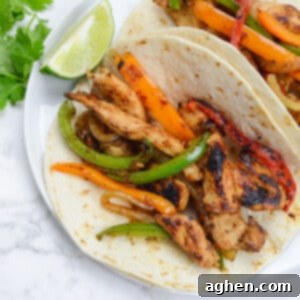 blackstone chicken fajitas on white plate