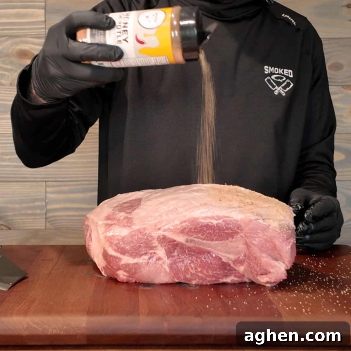 Signature Traeger Pulled Pork 5 A large pork butt fully seasoned with spice rub on all sides, ready for smoking.