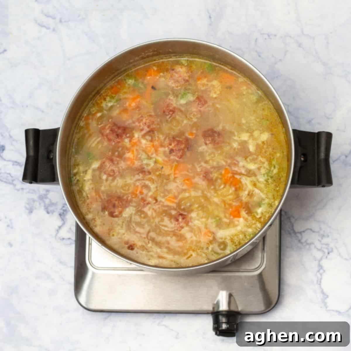 Italian Wedding Soup cooking in a saucepan
