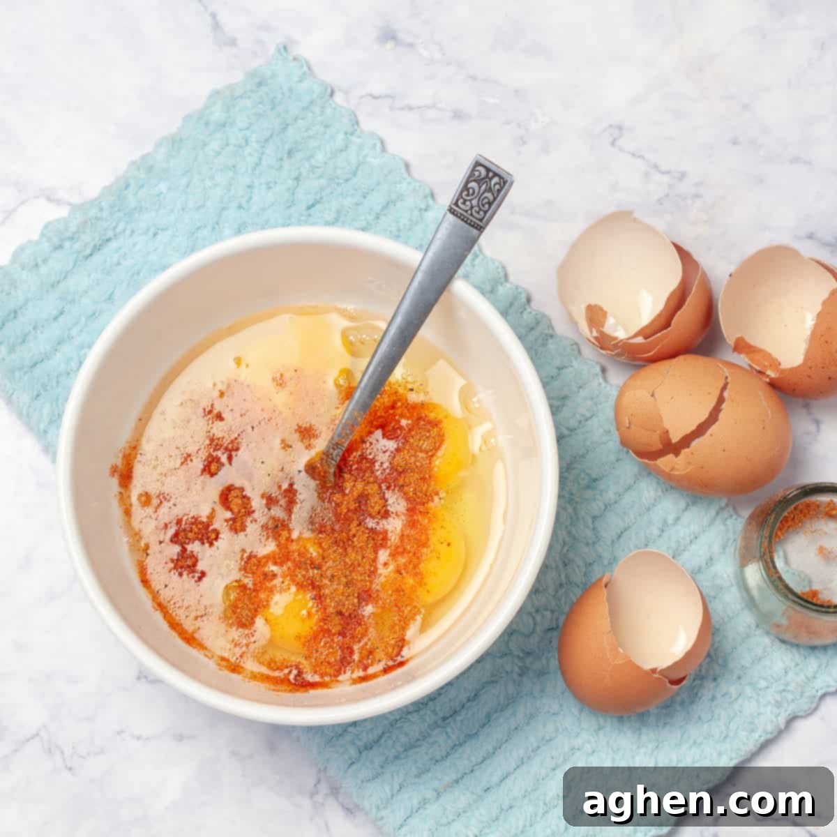 Classic Migas Gets a Healthy Makeover with Weight Watchers 5 Scrambling the eggs in a small bowl with Tex-Mex seasonings.