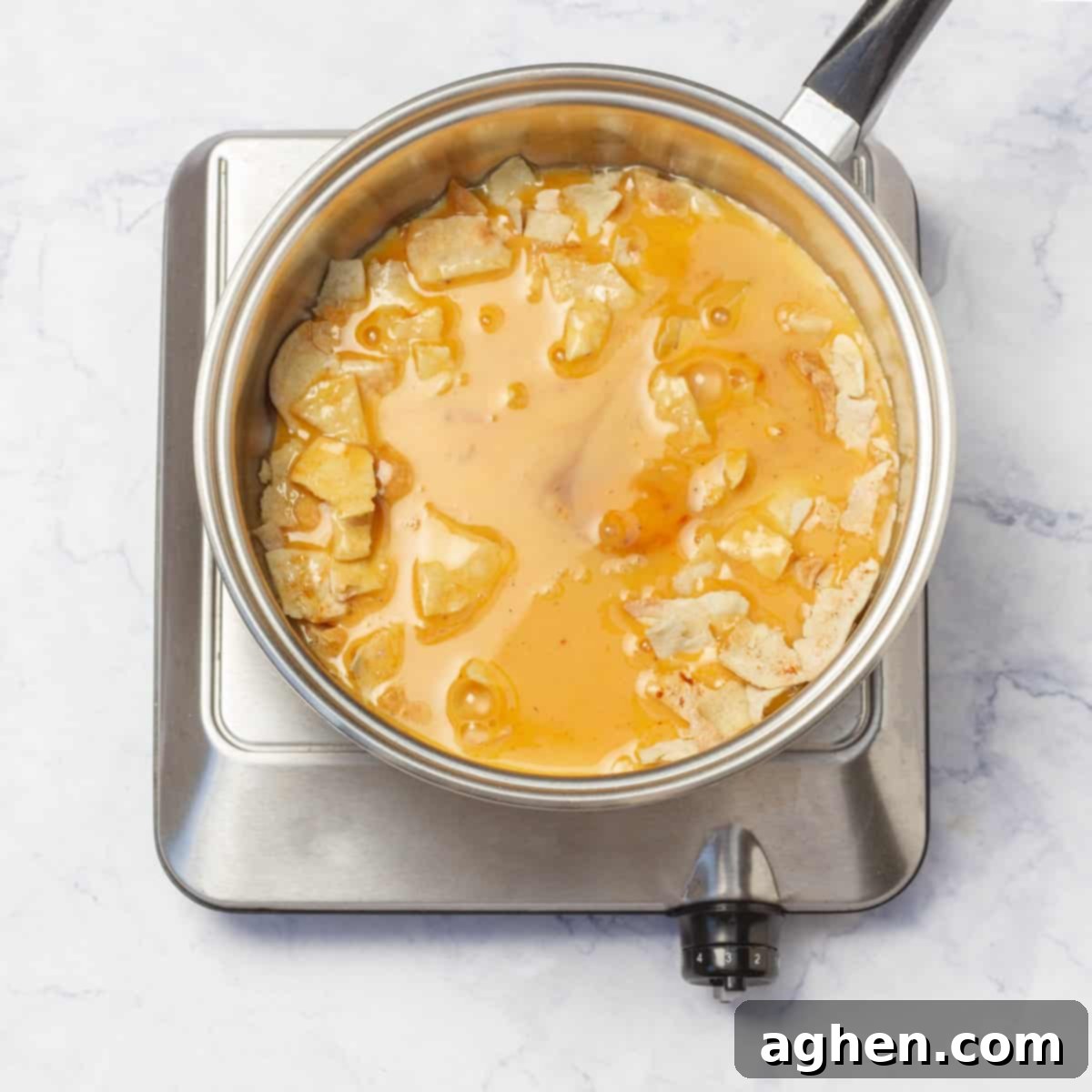 Classic Migas Gets a Healthy Makeover with Weight Watchers 6 Add the baked tortilla crumbs and scrambled eggs to a hot skillet.