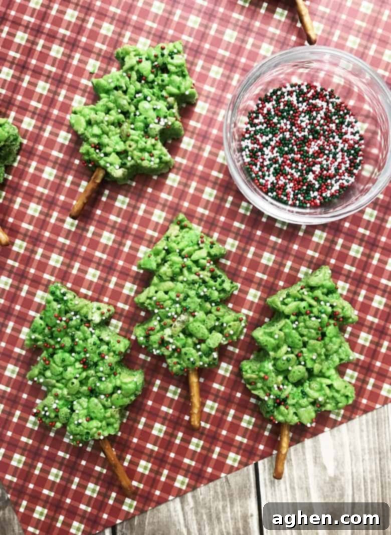 Close-up of a perfectly shaped green Rice Krispie Christmas Tree ready to be enjoyed as a holiday treat