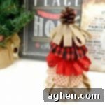 If you love rustic décor, you will absolutely adore this burlap ribbon Christmas tree craft. They are perfect for holiday decor or holiday gifting!