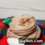 Gingerbread slime with small gingerbread man toy and christmas decor.