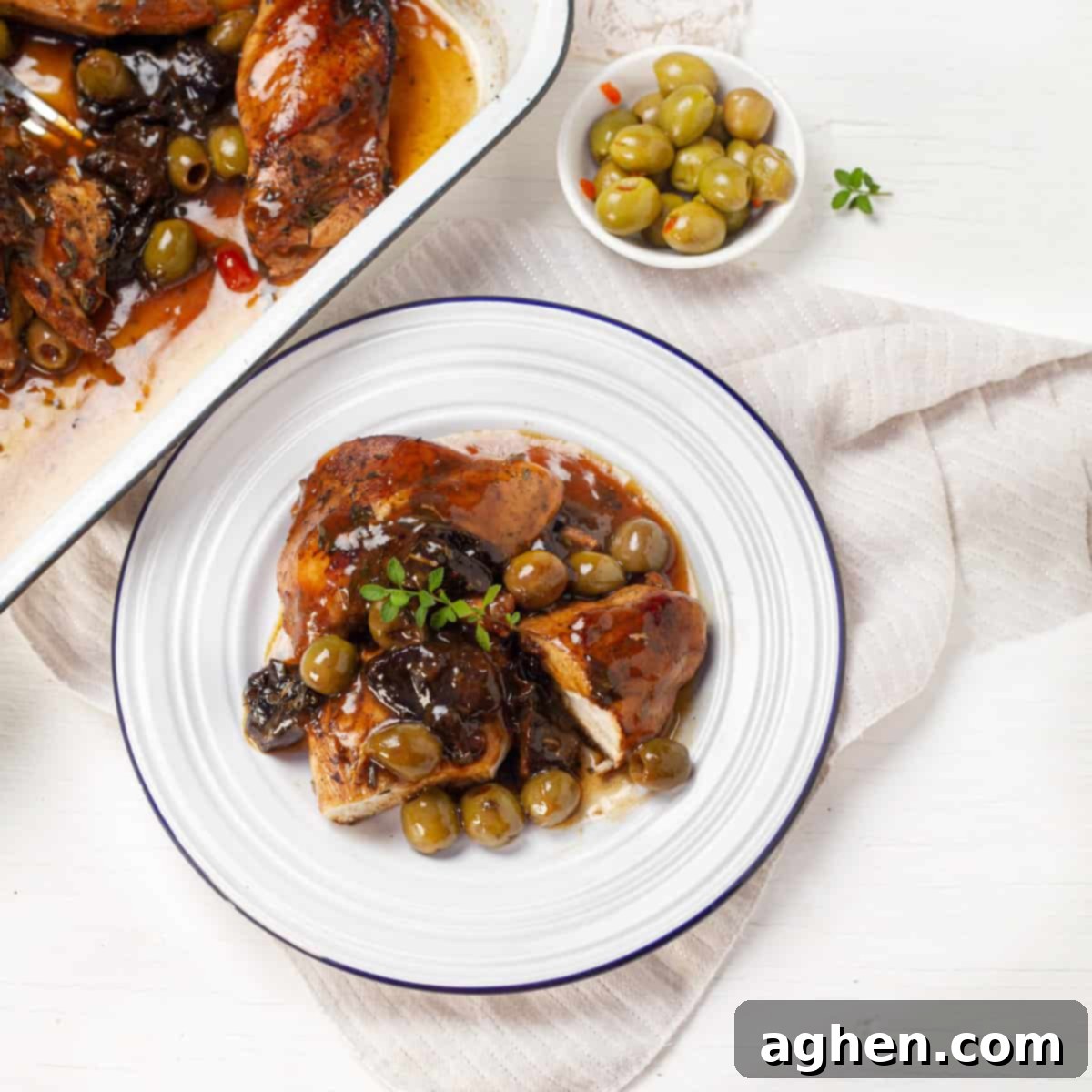 Chicken Marbella served in a tray and plate