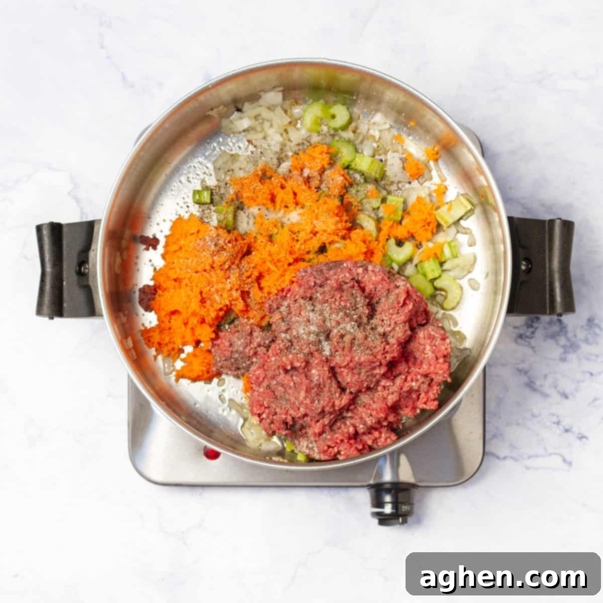 The Ultimate Weight Watchers Cheeseburger Soup 5 lean ground beef to the pot with the sautéed vegetables