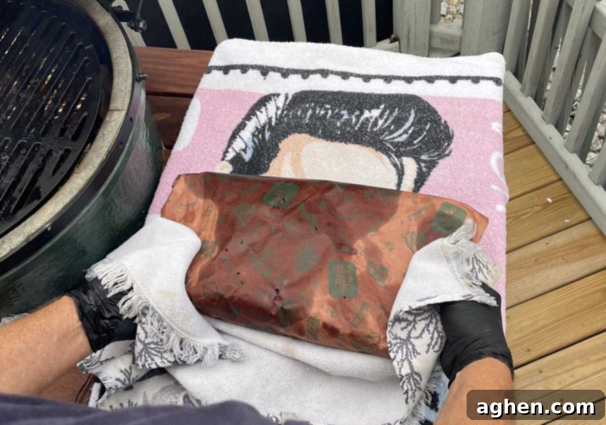 Aaron Franklin's Brisket: Can My Big Green Egg Handle It? 3 Brisket wrapped in butcher paper and resting in a cooler