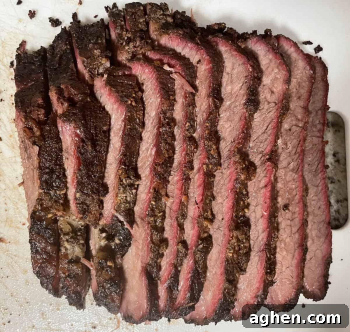 Aaron Franklin's Brisket: Can My Big Green Egg Handle It? 5 Seasoned brisket on a cutting board, ready for the smoker