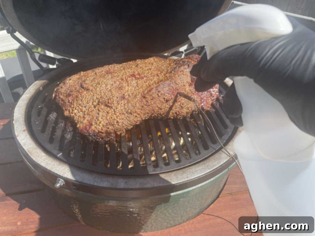 Aaron Franklin's Brisket: Can My Big Green Egg Handle It? 6 Smoked brisket on a Big Green Egg, showing developing bark
