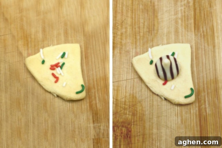 On the left: a quarter of biscuit dough flattened and sprinkled with cheerful Christmas sprinkles. On the right: the same flattened dough with a Hershey Kiss added on top, ready for rolling into a chocolate-stuffed monkey bread ball.