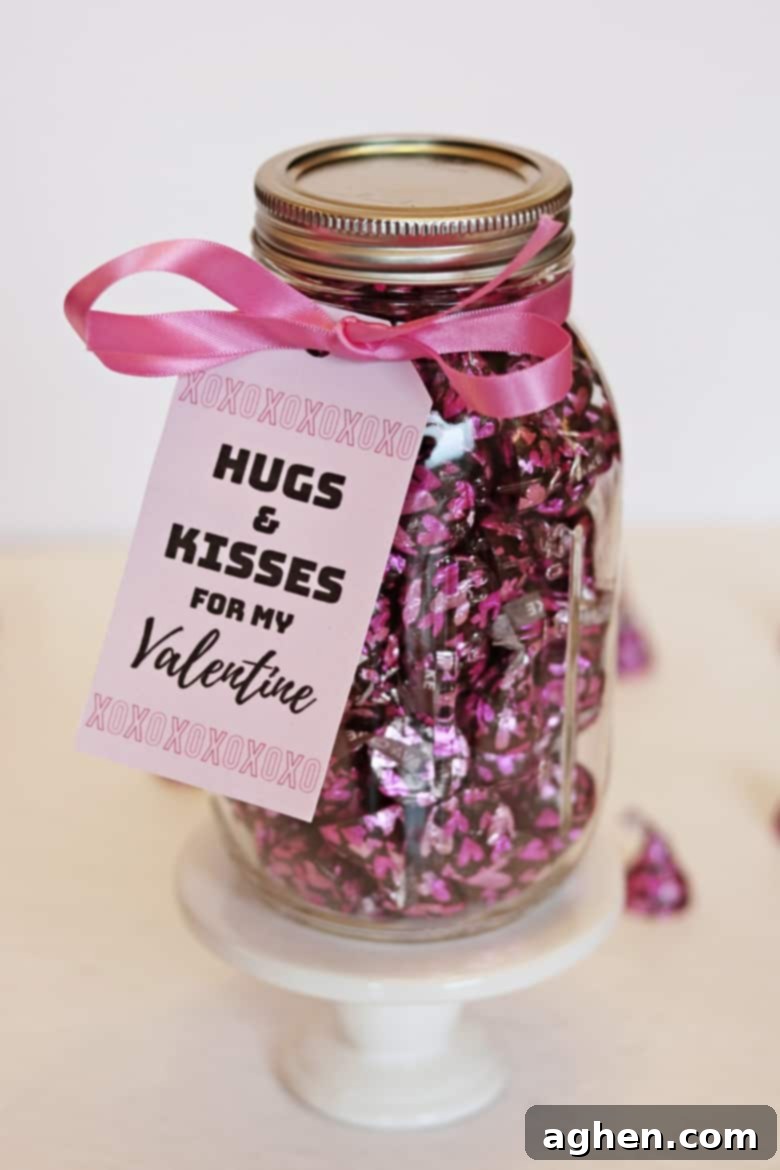 An easy mason jar Hershey Kisses Valentine gift tutorial, complete with a printable "hugs and kisses for my Valentine" label.