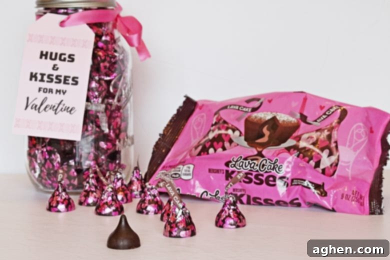 An easy mason jar Hershey Kisses Valentine gift tutorial, complete with a printable "hugs and kisses for my Valentine" label.