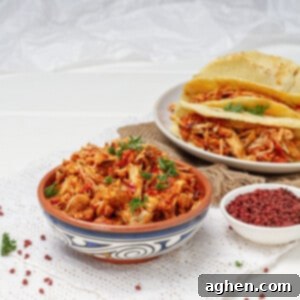 Chicken Pibil served hot in a bowl and with tortillas in a dish