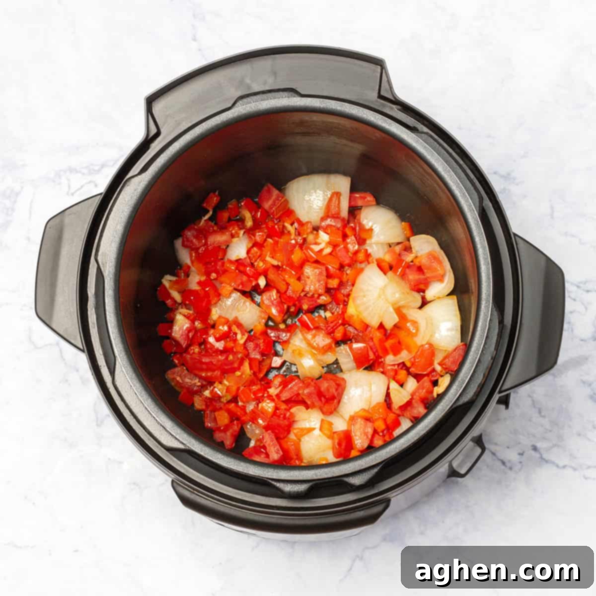 diced onion, minced garlic, diced tomatoes, and diced red bell pepper in instant pot
