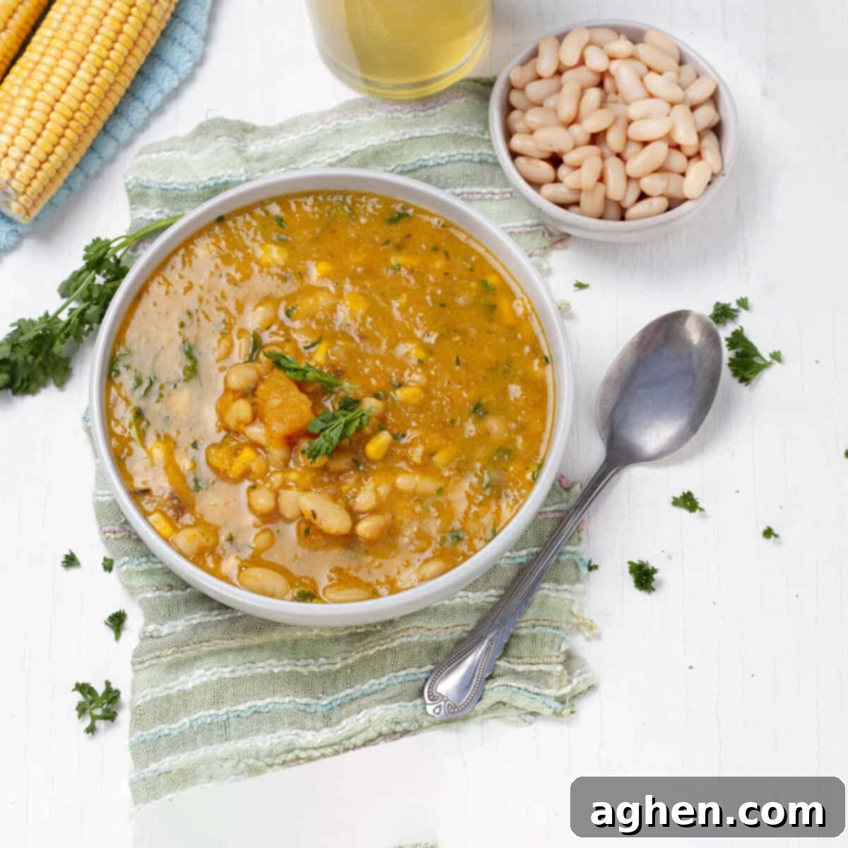 Guilt-Free Delicious Porotos Granados Soup Only 1 Weight Watchers Point 2 A steaming bowl of Porotos Granados Soup, garnished with fresh cilantro, showcasing its rich beans, corn, and creamy texture.