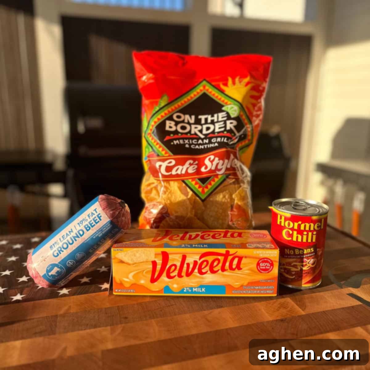 Whip Up Traeger Smoked Queso with Just 3 Ingredients 3 Ingredients for Smoked Queso Dip laid out on a table