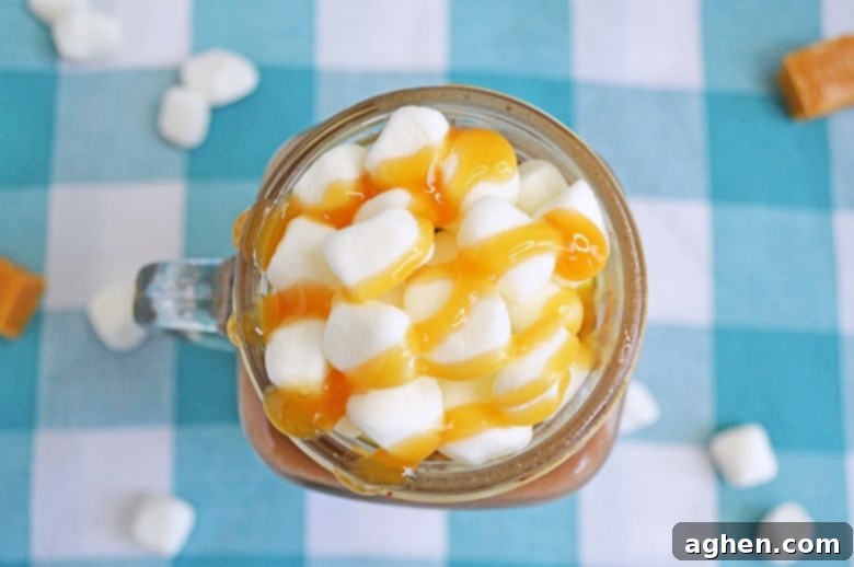 A rich and creamy salted caramel hot chocolate recipe that you can make easily right at home in your slow cooker.