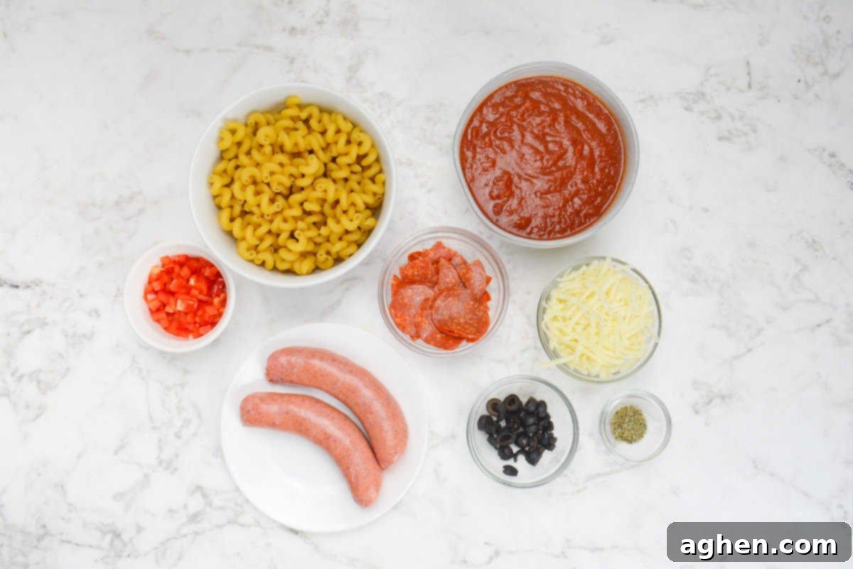 All of the ingredients to make pizza casserole in various sized bowls.