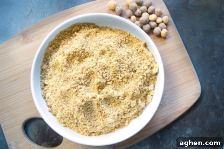 crushed Reese's Puffs cereal in a white bowl, on a wooden cutting board