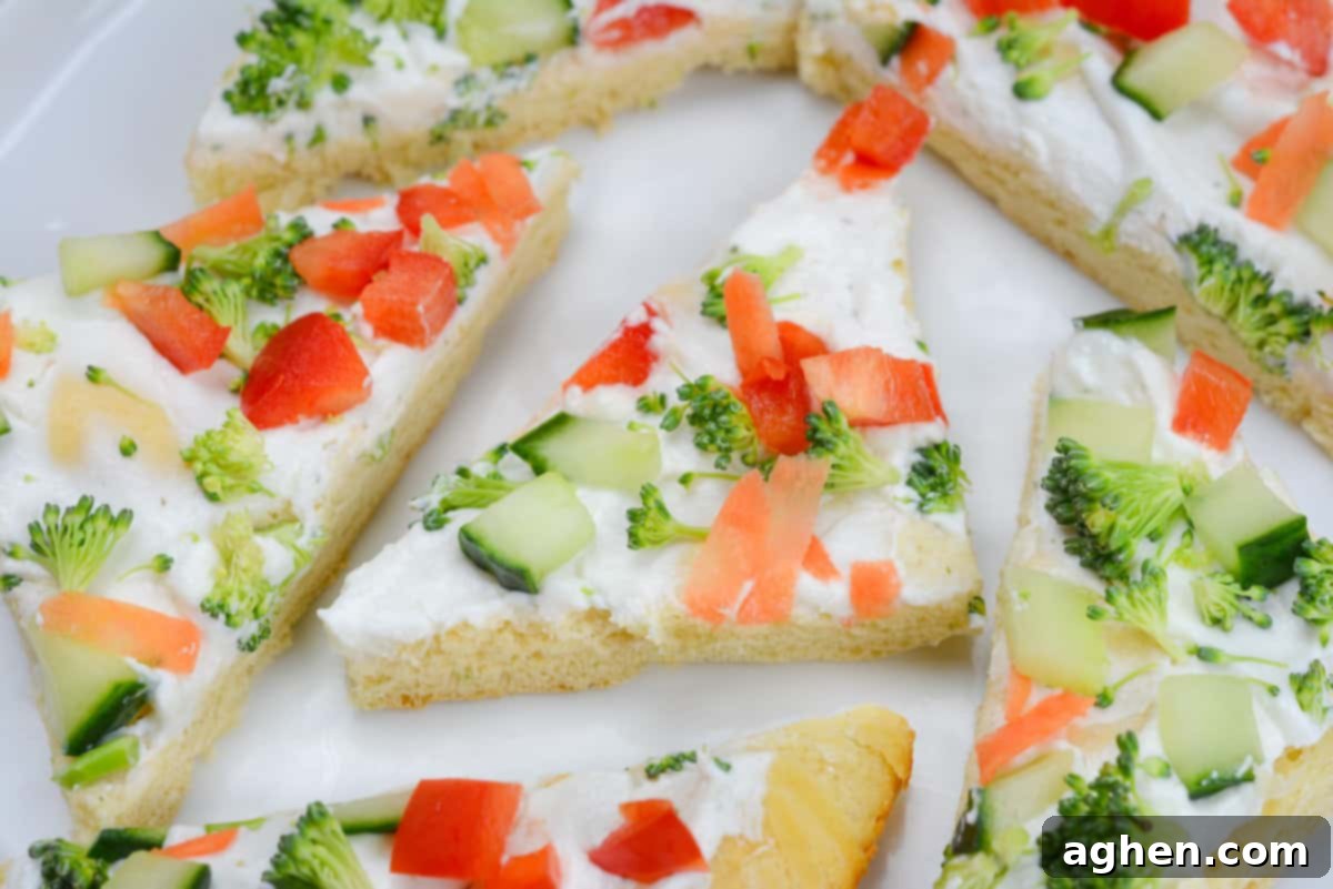 Close up of veggie pizza cut into triangles
