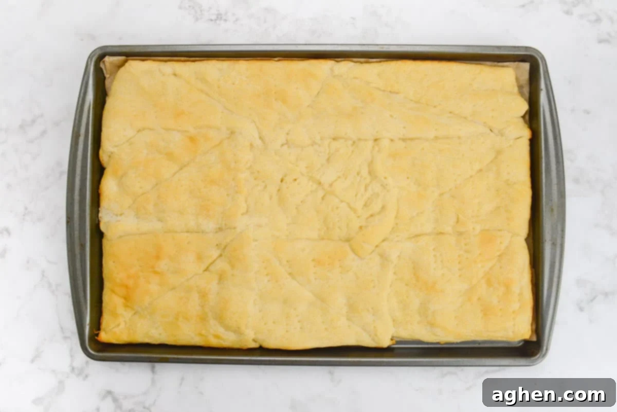 A baking tray with the golden brown baked crust 