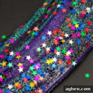 Learn how to make galaxy slime with this easy galaxy slime recipe. The dark colors and glitter combine for DIY slime that is truly out of this world! 