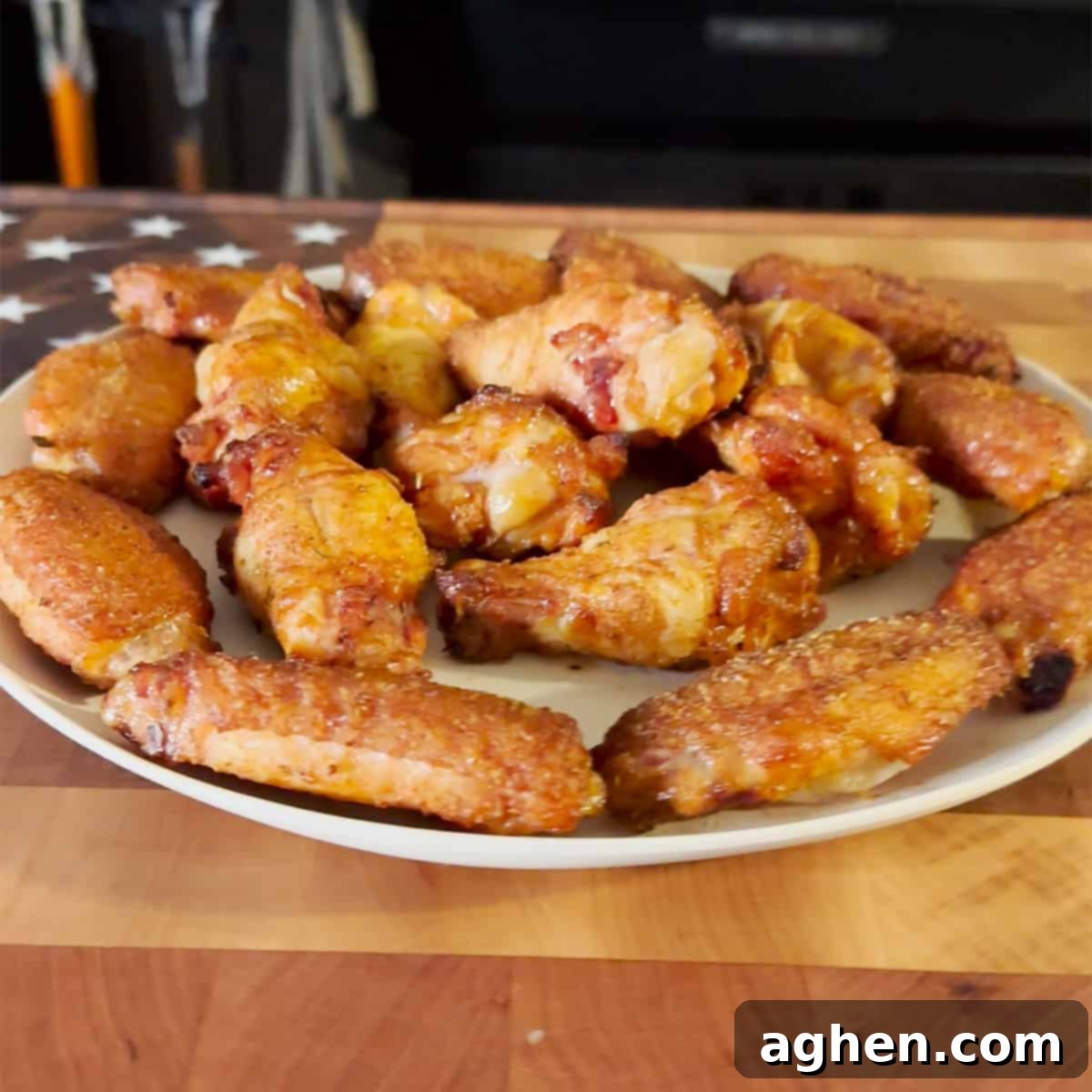 Smoked chicken wings arranged on a platter, ready to be served