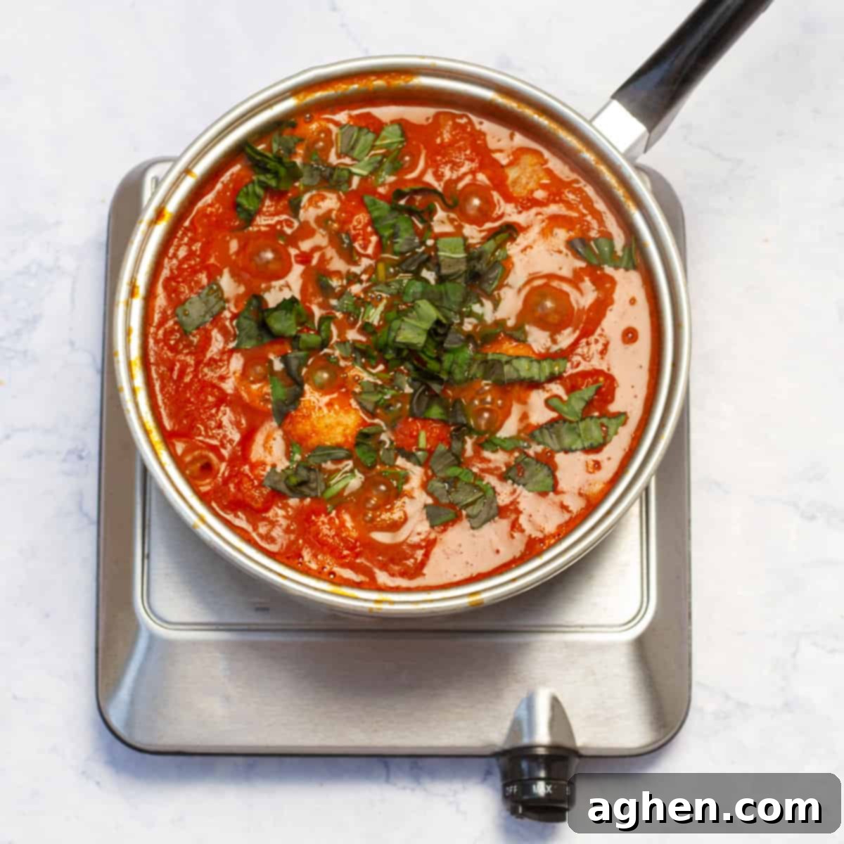 Whip Up Weight Watchers Chicken Meatballs in Just 30 Minutes 7 marinara sauce with water into the skillet with the meatballs