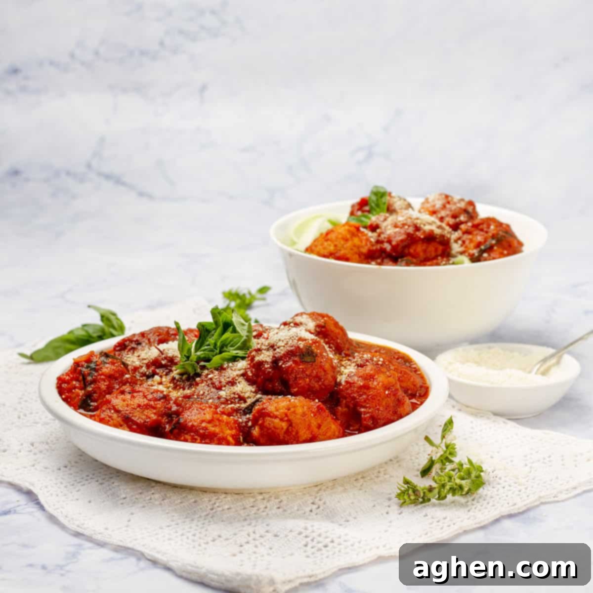 Whip Up Weight Watchers Chicken Meatballs in Just 30 Minutes 8 Pesto Chicken Meatballs in a bowl and plate