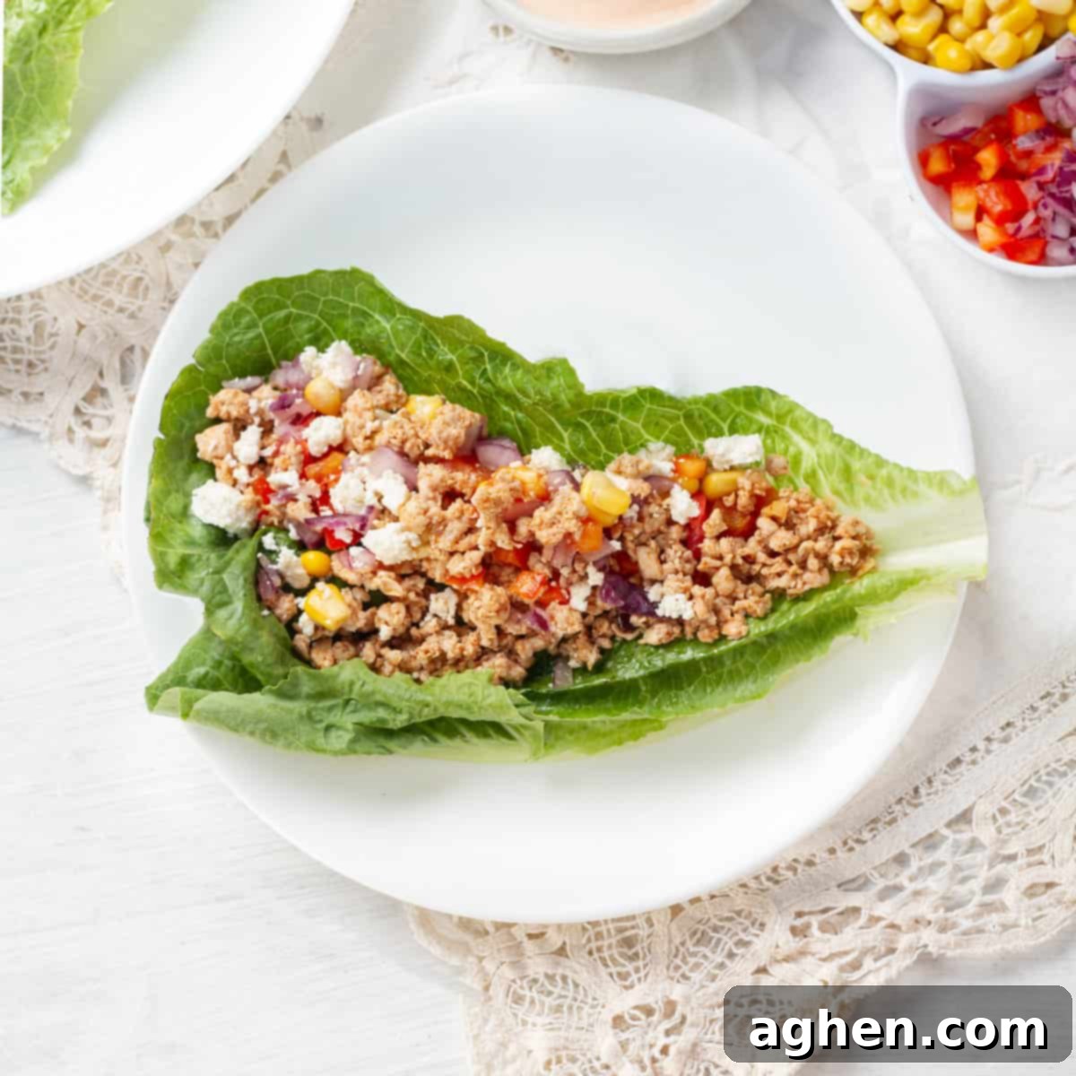 Multiple Turkey Taco Lettuce Wraps served together on a stylish plate, presenting a healthy and appealing meal.