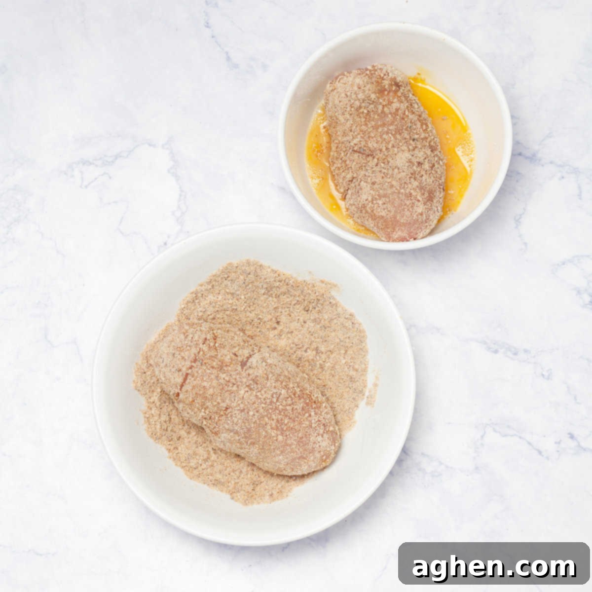 Weight Watchers Chicken Cordon Bleu Reimagined 7 Dipping a chicken roll into beaten egg and then into breadcrumbs