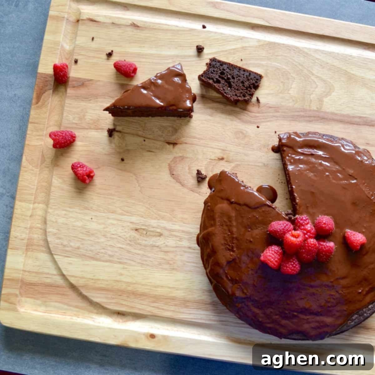 Indulge Guilt-Free Weight Watchers Low Point Mud Cake 5 Sliced chocolate mud cake with raspberries