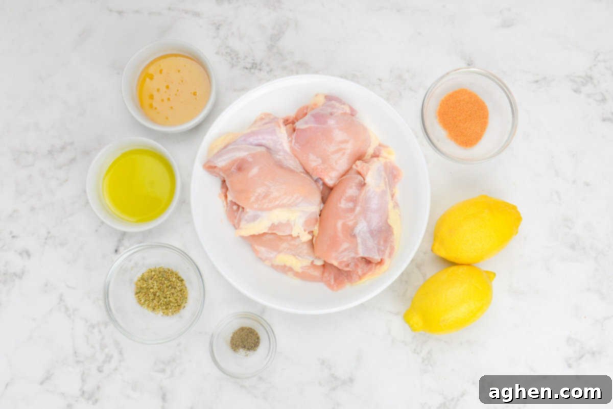 Raw chicken thighs are placed on a plate and surrounded by the ingredients to make the recipe in small bowls.