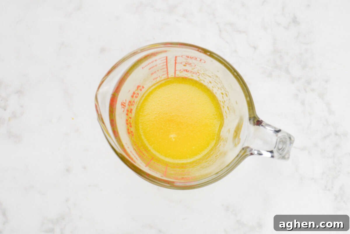 An overview view of the liquid mixture in a measuring cup