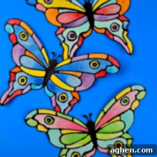 How to make a faux stained-glass butterfly craft using cardstock, glue, watercolors, and the provided printable butterfly template.