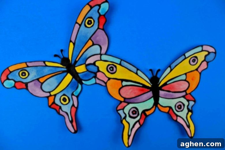 How to make a faux stained-glass butterfly craft using cardstock, glue, watercolors, and the provided printable butterfly template.