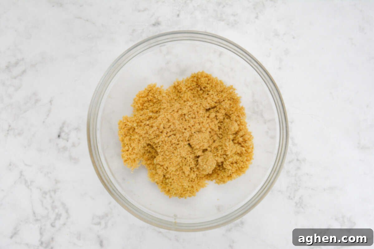 A large clear bowl filled with the crust ingredients