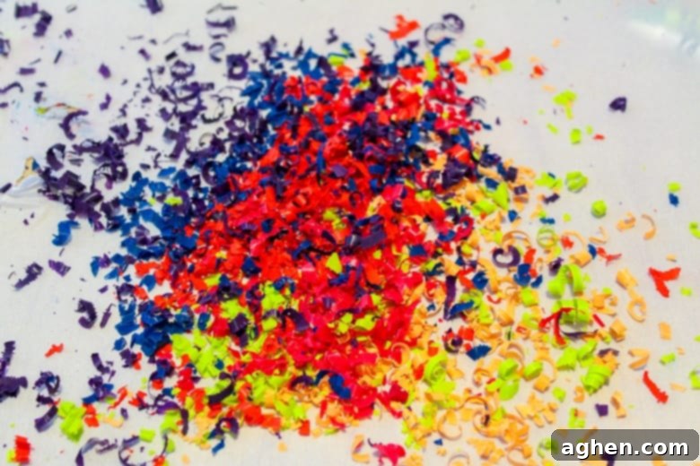 colorful crayon shavings on top of wax paper