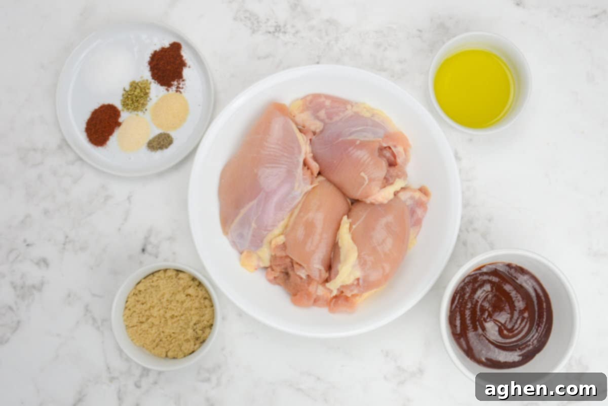 Large plate of raw chicken thighs with the recipe ingredients placed in various sized bowls surrounding the thighs