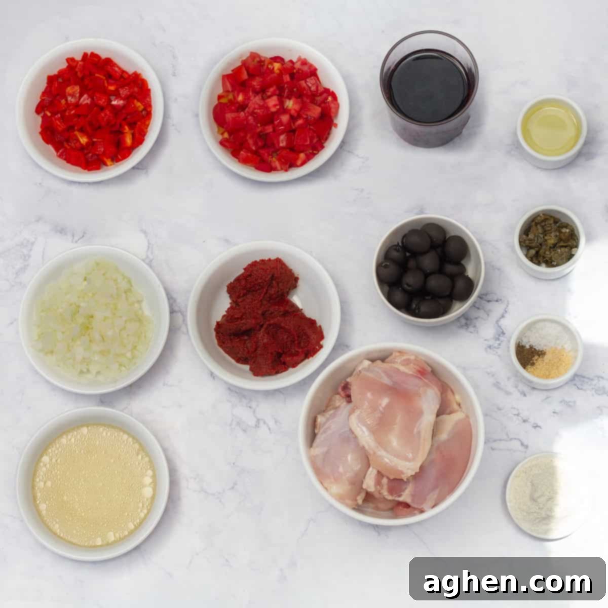 Smart & Savory Chicken Cacciatore 3 A selection of fresh ingredients for Chicken Cacciatore including chicken thighs, vegetables, and herbs