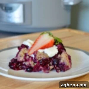 Plated slow cooker cobbler with fresh strawberries