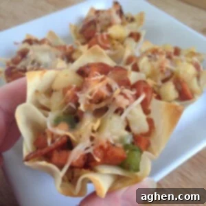 Close-up of a golden-brown breakfast wonton cup