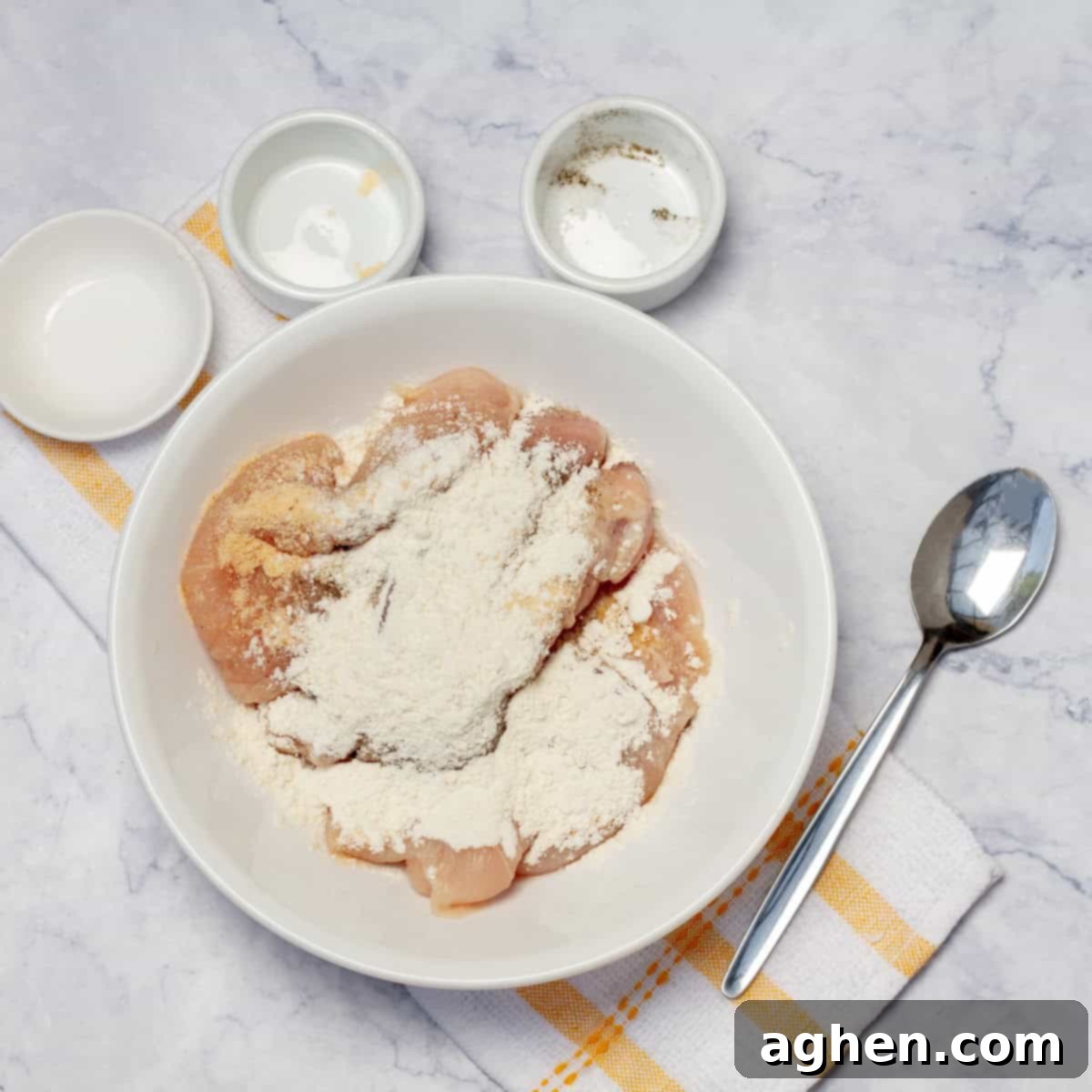 Velvety Chicken Paprikash 4 Patting chicken breasts dry and seasoning them with salt and pepper