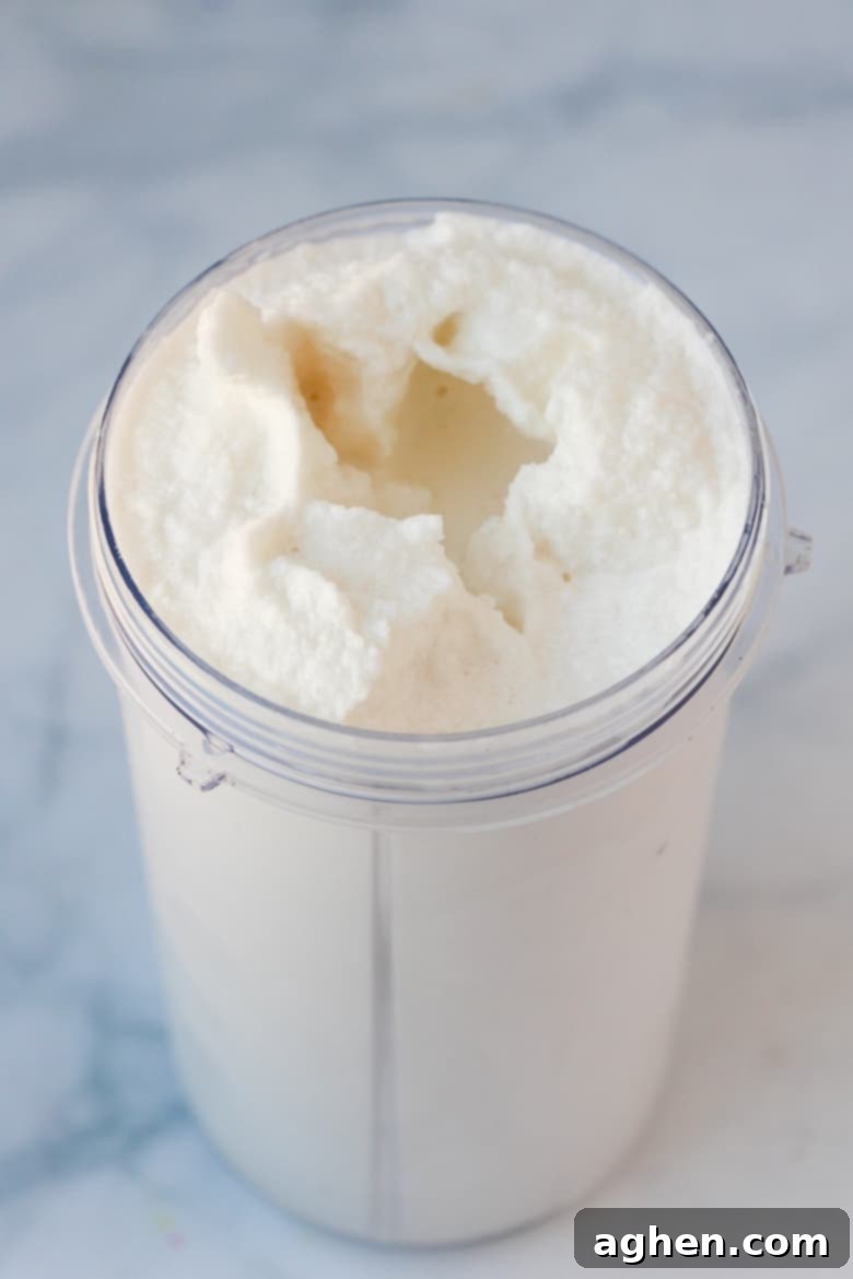 Nutribullet cup filled with freshly made vanilla bean frappe