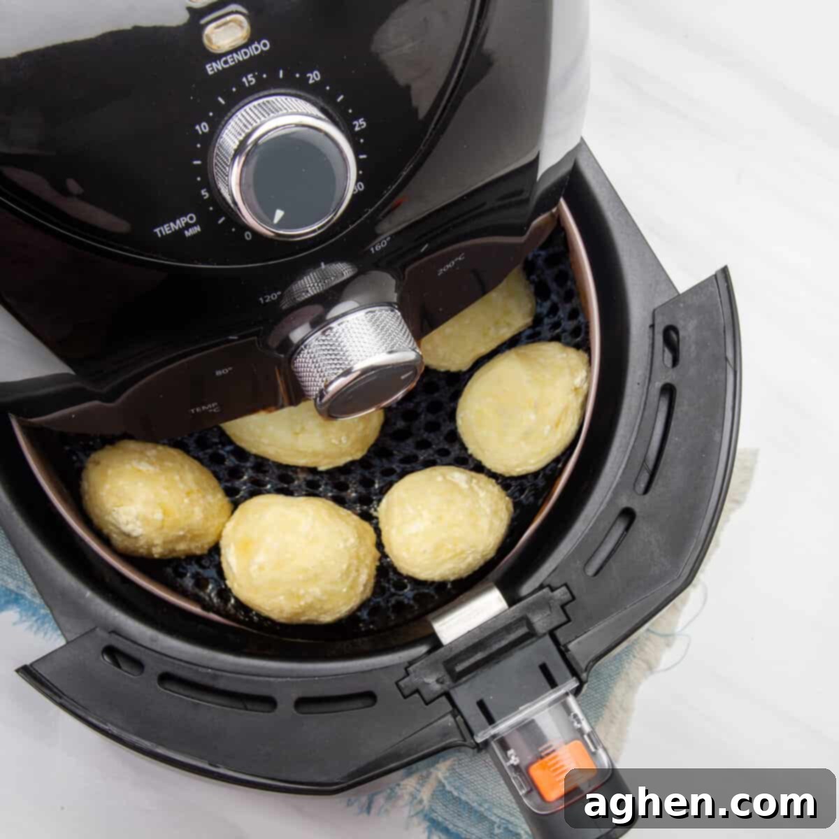 Golden Yucca Delights 8 Cook the fritters in the air fryer