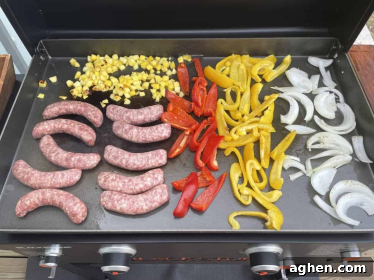 sausages and peppers on a blackstone griddle